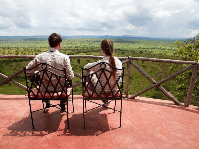 Kenya Honeymoon: The Safari Escape That’s Anything but Ordinary 3 couple looking at the view from their safari lodge