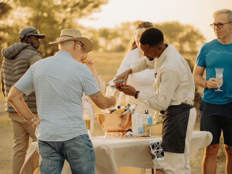 golden hour sundowners on safari in tanzania