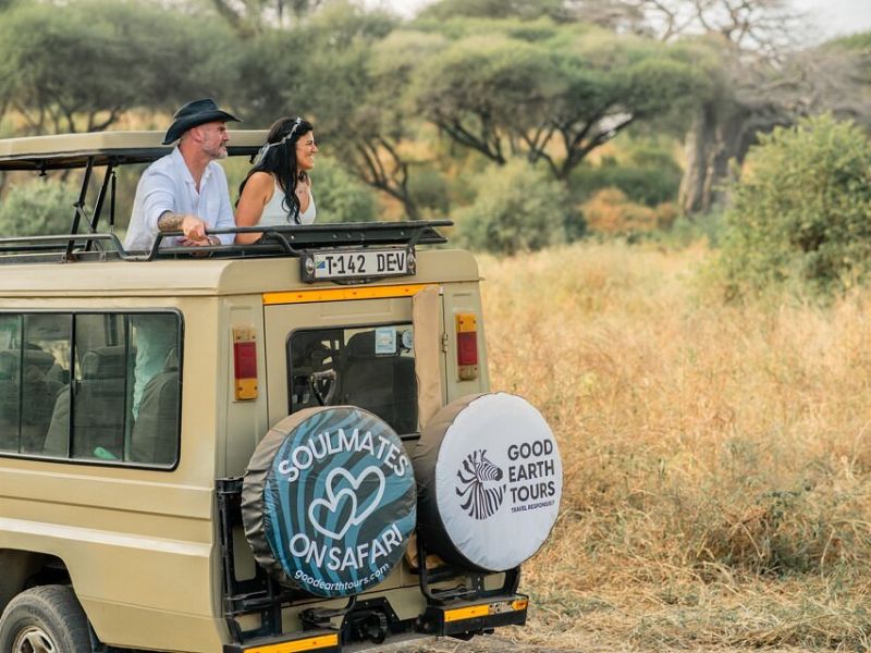7 Small Destination Wedding Locations in Africa for Intimate Celebrations 1 bride and groom in safari vehicle