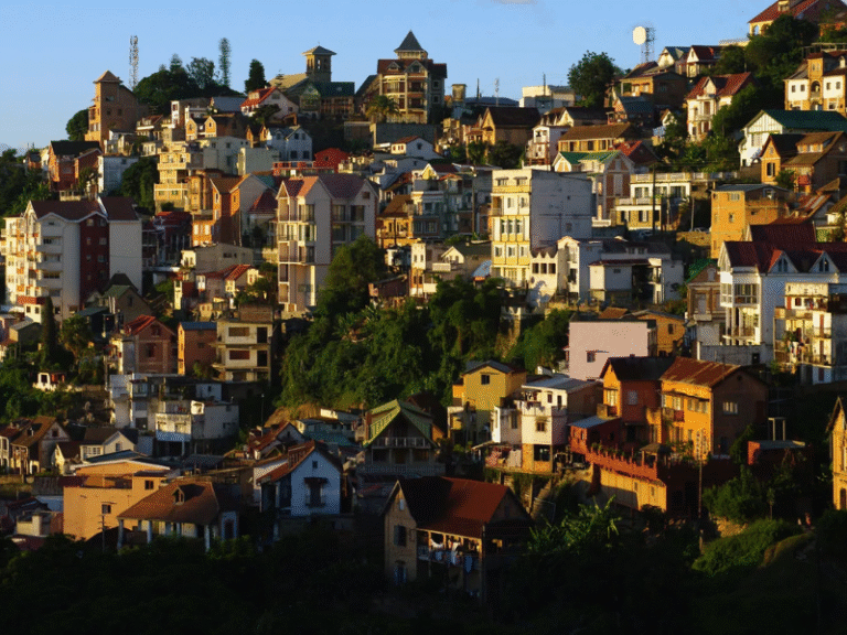 Colorful hillside buildings in Antananarivo, the capital of Madagascar, known for its vibrant architecture and city views.