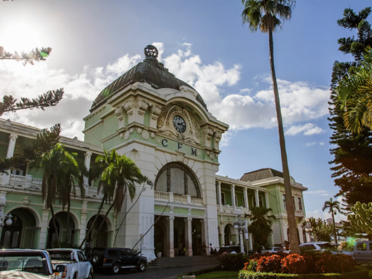 The historic Maputo Railway Station in Mozambique’s capital, a landmark with colonial architecture and palm-lined surroundings.