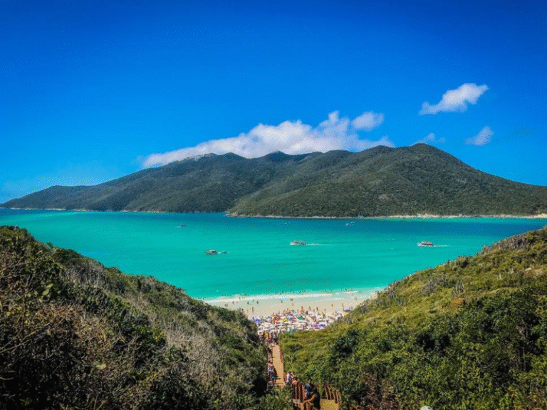 Scenic view of Ponta do Ouro’s turquoise waters and green hills, a coastal paradise in southern Mozambique known for diving and dolphins.