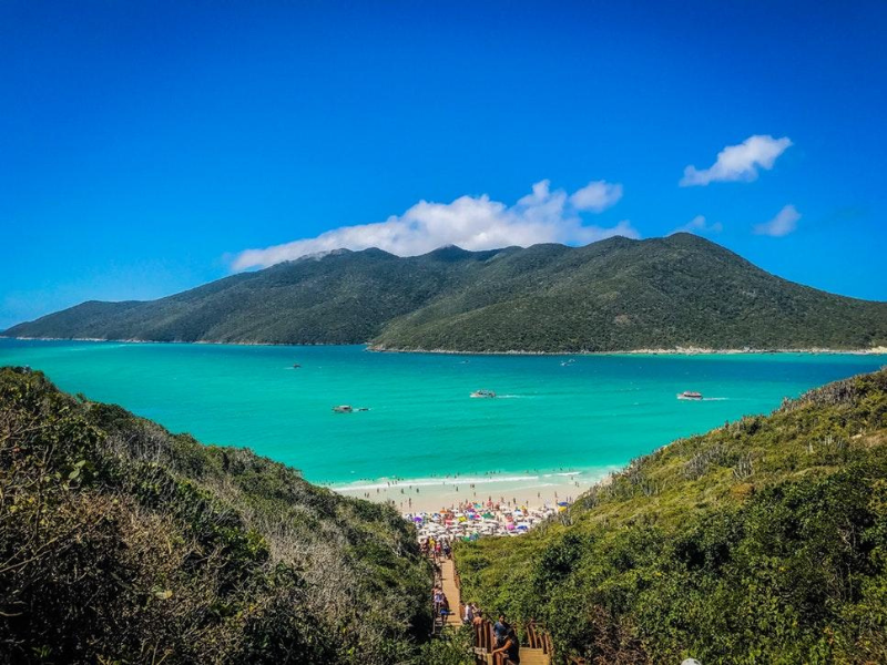Scenic view of Ponta do Ouro’s turquoise waters and green hills, a coastal paradise in southern Mozambique known for diving and dolphins.