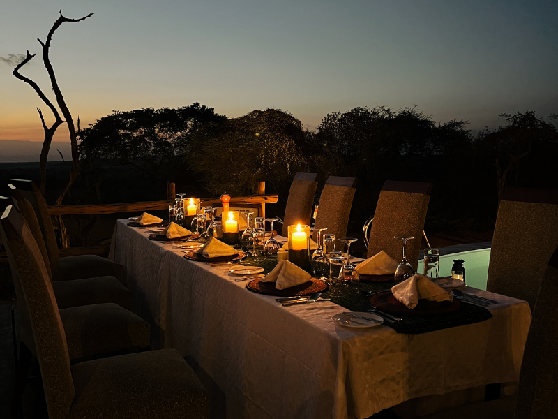 Private candlelit bush dinner during an Africa all inclusive safari experience.