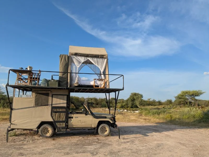 Best Places to Visit in Namibia: A First-Hand Guide 7 Custom sleep-out Land Cruiser with a four-poster bed and lounge on the roof, Onguma Game Reserve Namibia