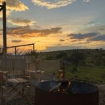 The sunset over the Serengeti from the campfire at Jackals Lair